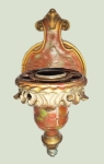 Antigo aplique para 1 lâmpada de procedência Européia em bronze patinado com leve tom de vinho. Mede 18 cm.